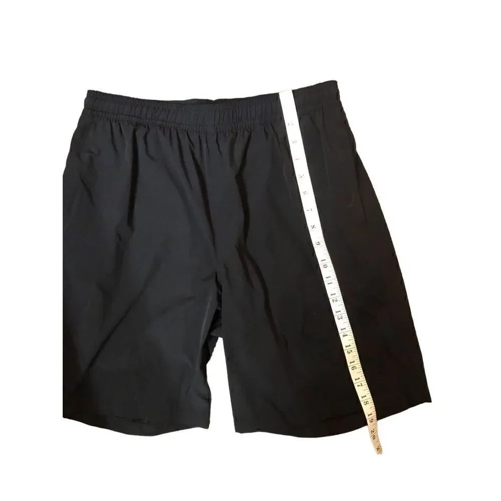 Kirkland’s black swim trunks